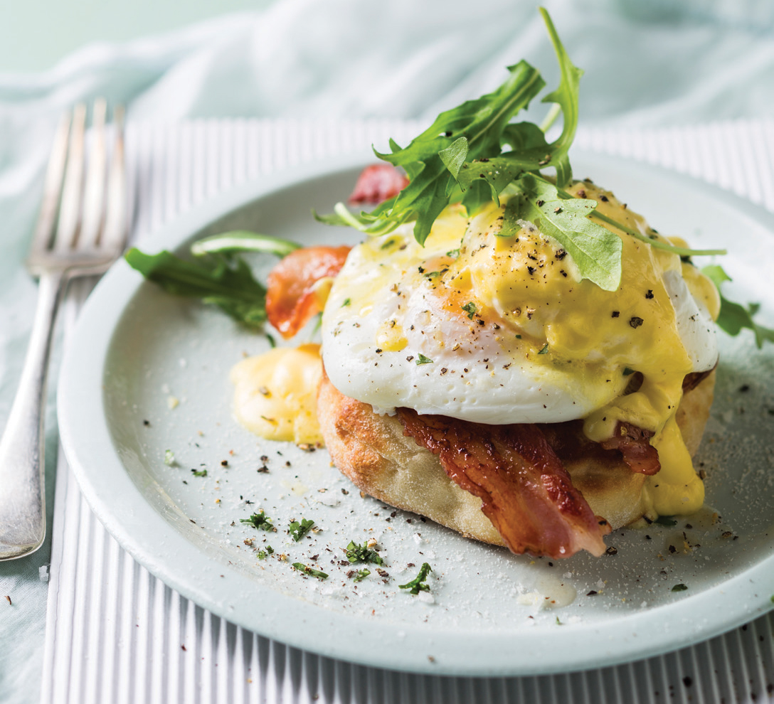 Prepared Eggs Benedict dish on the table.