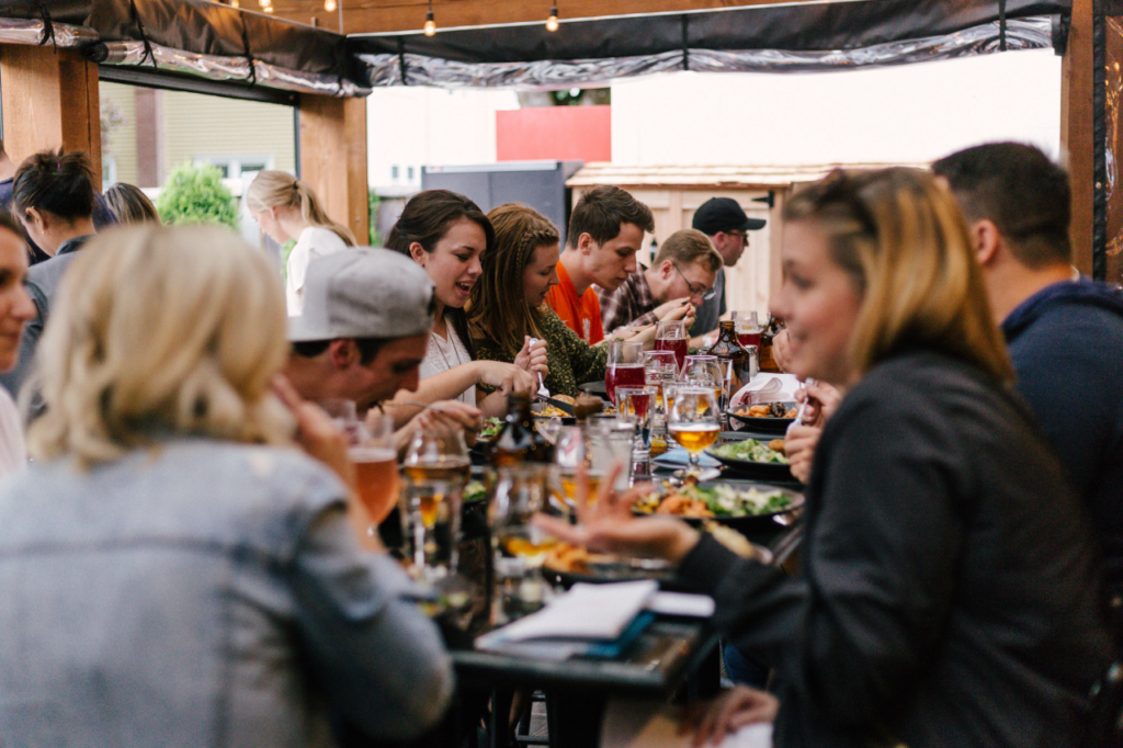 People are eating and drinking.