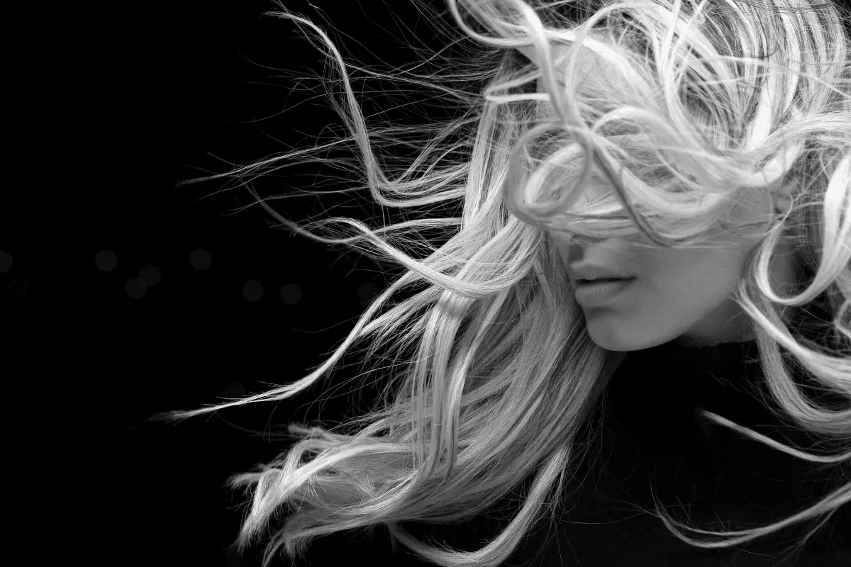 Fashion black and white photography of a blond girl