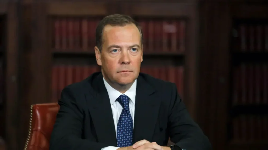 Dmitry Medvedev is sitting in the office