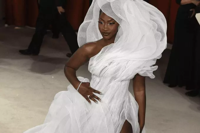 Tems in white dress at 95th Academy Awards